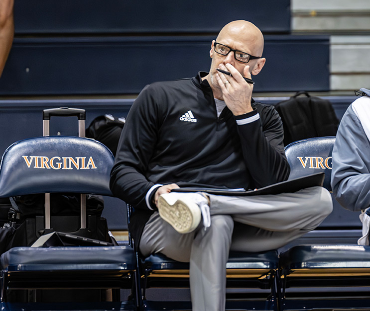 Head coach looking onto court